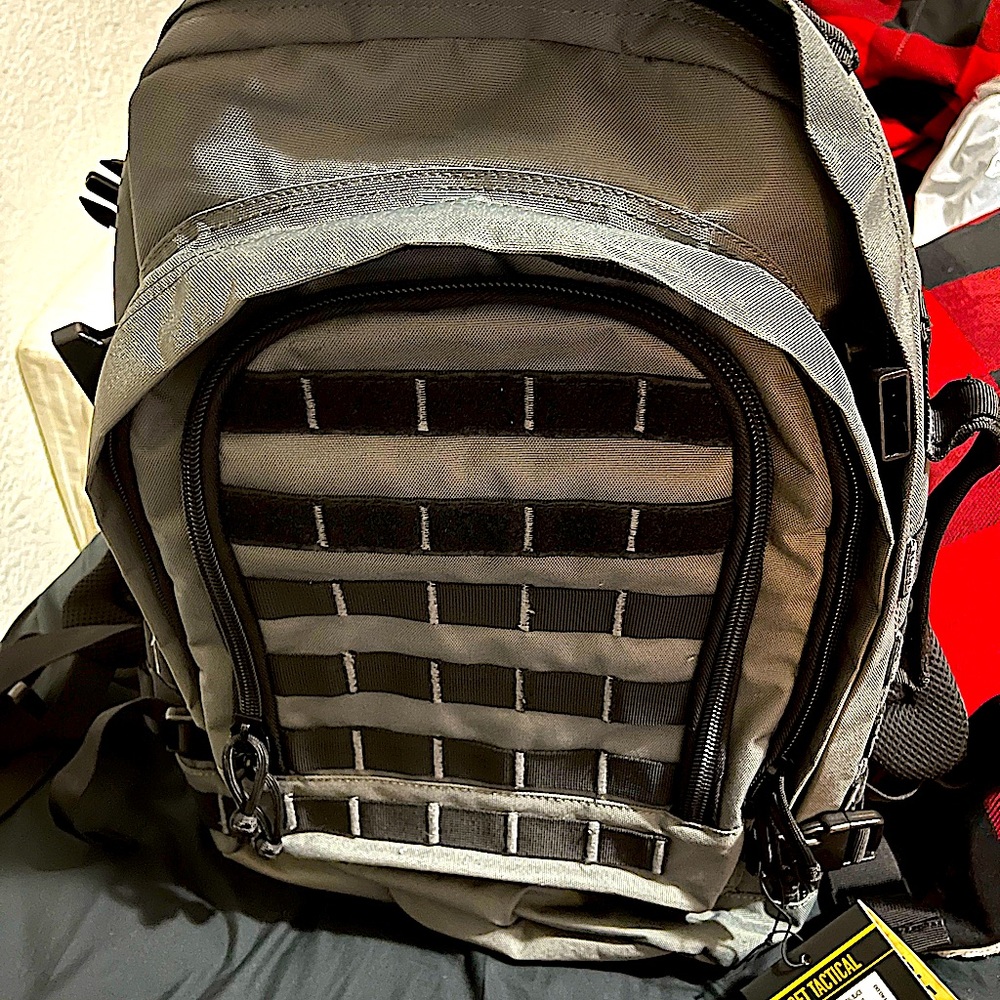 A tactical bag for camping or outdoors brand new still has tags on it